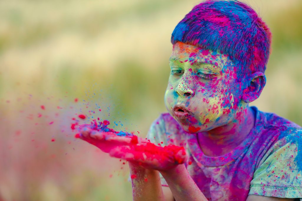 essay on holi in about 150 words